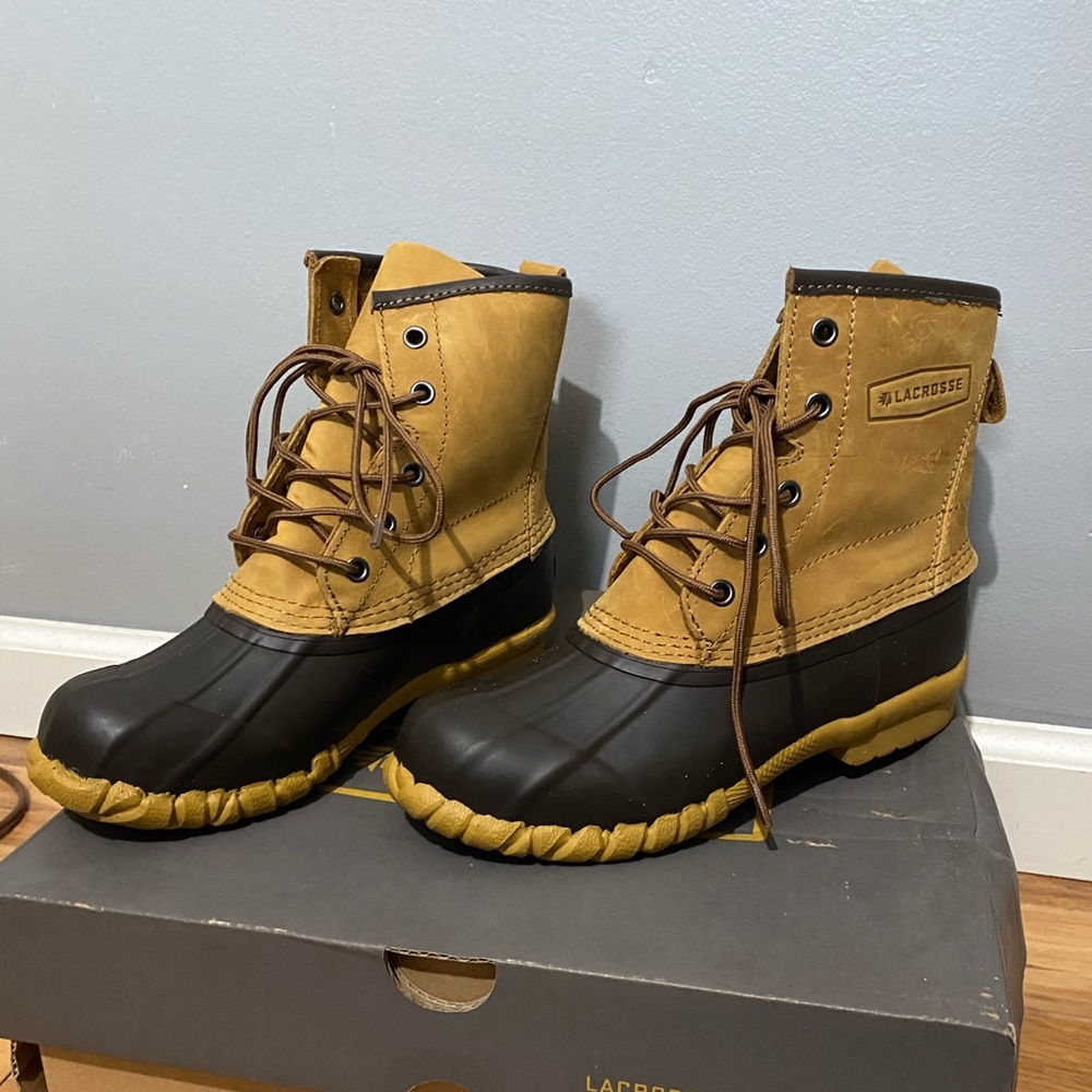 Lacrosse boots. Size 7, worn once. Rain repellant